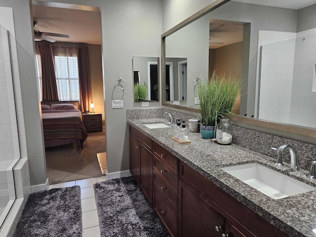7508 Eagle Dr, Santee, CA 92071 - full bath with double vanity, ensuite bathroom, ceiling fan, a tile shower, and tile patterned flooring