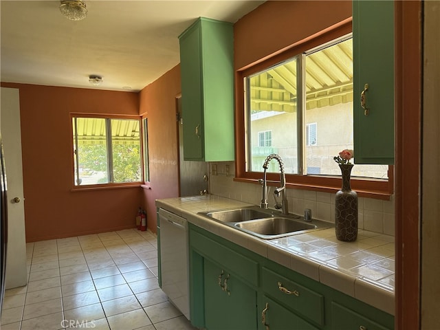 7135 Sultana Ave, San Gabriel, CA 91775 - kitchen with green cabinets, dishwasher, tile countertops, and backsplash