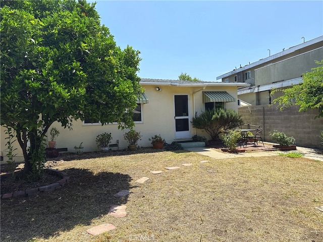 7135 Sultana Ave, San Gabriel, CA 91775 - view of front of property with stucco siding and a patio