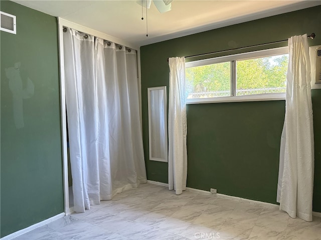 7135 Sultana Ave, San Gabriel, CA 91775 - empty room featuring a ceiling fan and marble look tile flooring