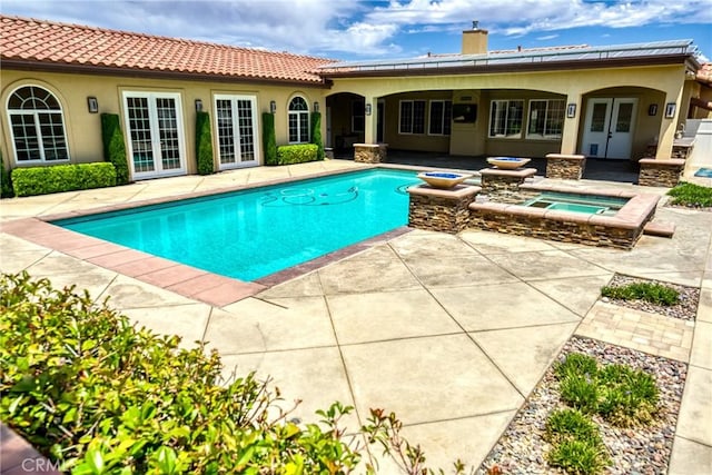 125 W Franklin Ave, Ridgecrest, CA 93555 - outdoor pool featuring french doors, an in-ground hot tub, and a patio area