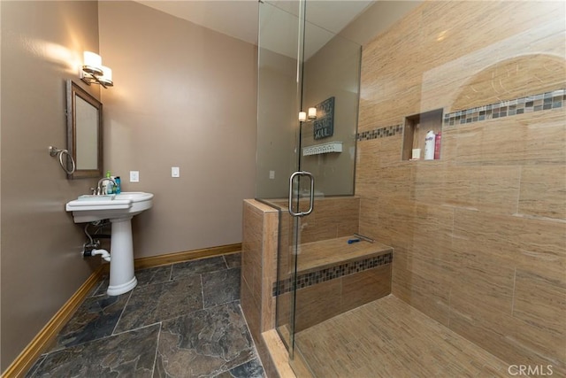125 W Franklin Ave, Ridgecrest, CA 93555 - bathroom featuring stone tile flooring and a stall shower