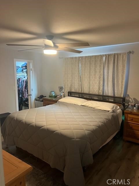 942 Front St, Perris, CA 92570 - bedroom featuring wood finished floors, ceiling fan, and a spacious closet