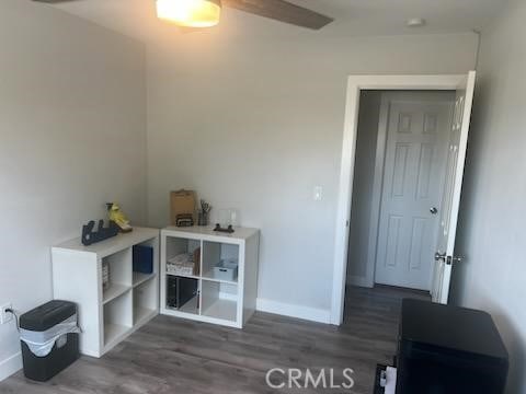 942 Front St, Perris, CA 92570 - office with dark wood-type flooring and ceiling fan