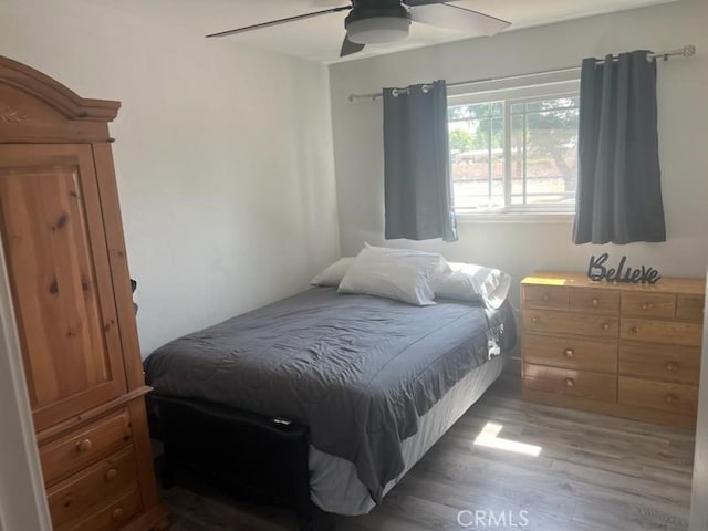 942 Front St, Perris, CA 92570 - bedroom featuring wood finished floors and a ceiling fan