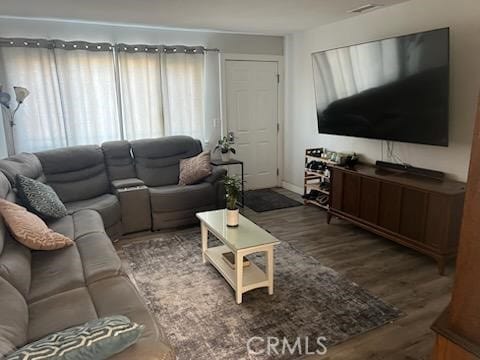 942 Front St, Perris, CA 92570 - living room with wood finished floors