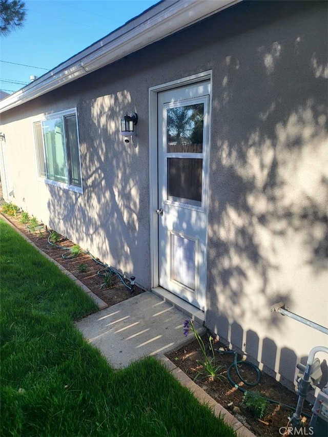 942 Front St, Perris, CA 92570 - entrance to property featuring stucco siding