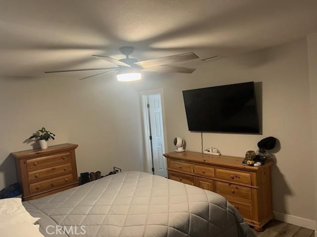 942 Front St, Perris, CA 92570 - bedroom featuring a ceiling fan and light wood finished floors