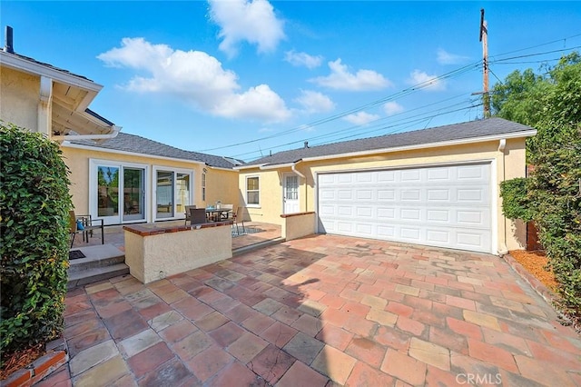 1872 Tulane Ave, Long Beach, CA 90815 - view of patio with a garage and driveway