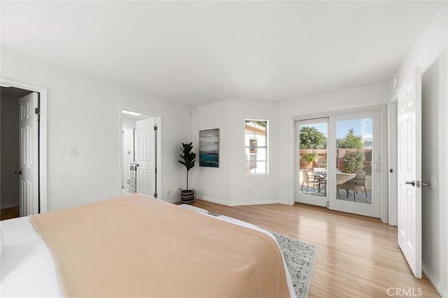 1872 Tulane Ave, Long Beach, CA 90815 - bedroom with access to outside and light wood-style floors