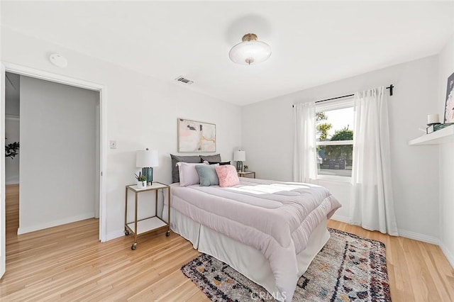 1872 Tulane Ave, Long Beach, CA 90815 - bedroom with light wood-style flooring and baseboards