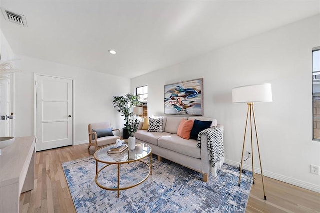 1872 Tulane Ave, Long Beach, CA 90815 - living room featuring light wood-type flooring and recessed lighting