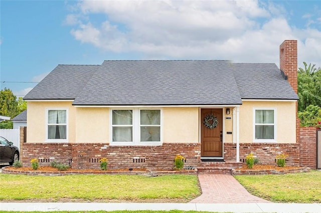 1872 Tulane Ave, Long Beach, CA 90815 - bungalow-style home featuring stucco siding, roof with shingles, brick siding, and a chimney