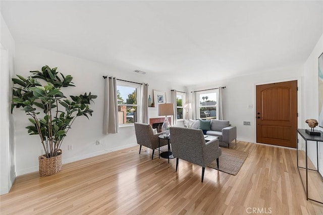 1872 Tulane Ave, Long Beach, CA 90815 - living room with light wood-style floors and baseboards