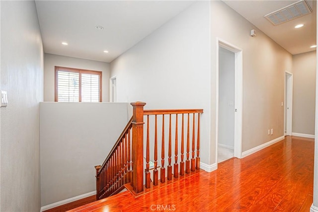 6221 Ruby Crest Way, Jurupa Valley, CA 91752 - stairway featuring wood finished floors and recessed lighting