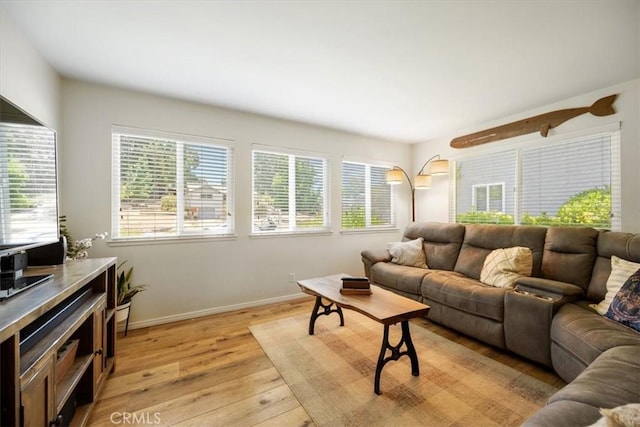 7635 Sombrilla Ave, Atascadero, CA 93422 - living room with light wood finished floors and plenty of natural light