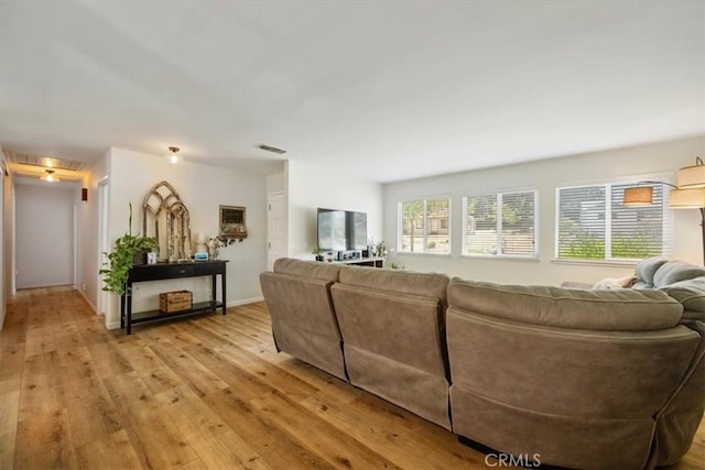 7635 Sombrilla Ave, Atascadero, CA 93422 - living room with light wood-type flooring