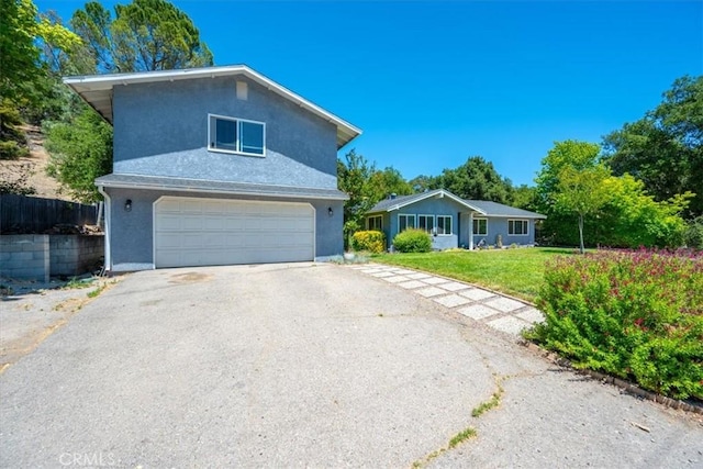 7635 Sombrilla Ave, Atascadero, CA 93422 - traditional-style home featuring stucco siding, driveway, and an attached garage