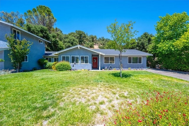 7635 Sombrilla Ave, Atascadero, CA 93422 - view of front of house with a front lawn and stucco siding
