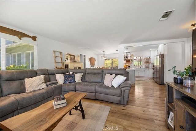 7635 Sombrilla Ave, Atascadero, CA 93422 - living room with light wood-type flooring