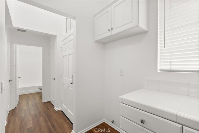 20331 Bluffside Unit A408, Huntington Beach, CA 92646 - mudroom with dark wood finished floors