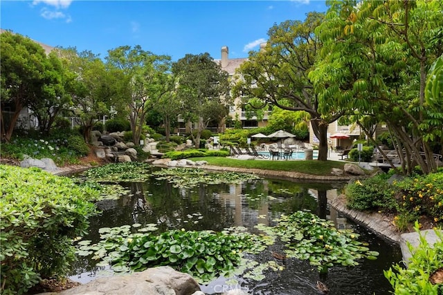 20331 Bluffside Unit A408, Huntington Beach, CA 92646 - view of home's community with a small pond