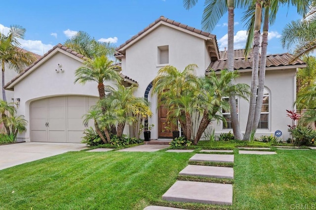 3239 Avenida La Cima, Carlsbad, CA 92009 - mediterranean / spanish-style home featuring stucco siding, a tile roof, a front yard, and driveway