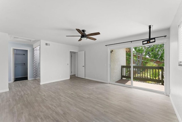 155 Countrywood Ln, Encinitas, CA 92024 - unfurnished living room featuring wood finished floors and a ceiling fan