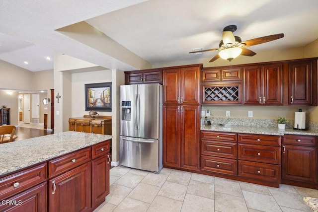 116 La Veta Dr, Camarillo, CA 93012 - kitchen with stainless steel refrigerator with ice dispenser, dark brown cabinets, ceiling fan, light stone counters, and recessed lighting