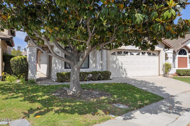 116 La Veta Dr, Camarillo, CA 93012 - obstructed view of property with driveway, a front yard, and stucco siding