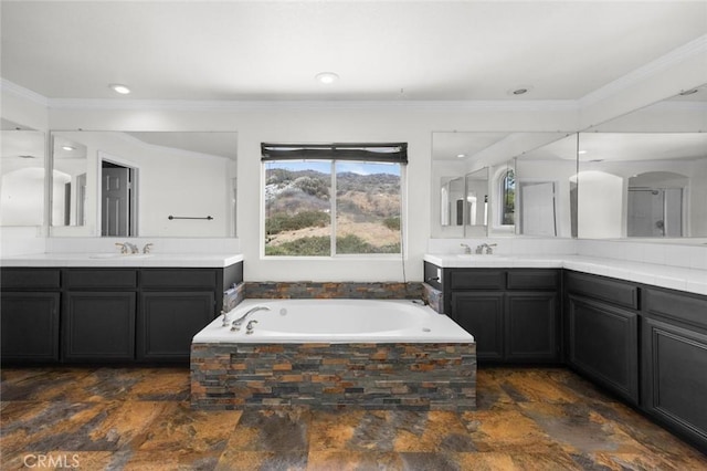 5 Vista Loreta, Lake Elsinore, CA 92532 - full bath with two vanities, a garden tub, stone finish floors, ornamental molding, and recessed lighting