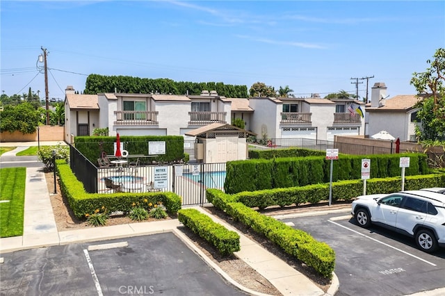 12698 Shearer Ln, Garden Grove, CA 92843 - view of property featuring uncovered parking and a residential view