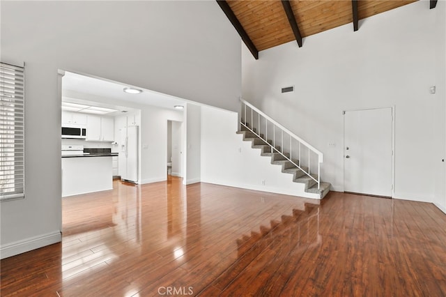 12698 Shearer Ln, Garden Grove, CA 92843 - unfurnished living room featuring stairway, a wood ceiling with exposed beams, high vaulted ceiling, and wood finished floors