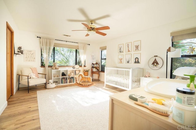 2278 Casitas Del Sol, Fallbrook, CA 92028 - bedroom with light wood finished floors and a ceiling fan