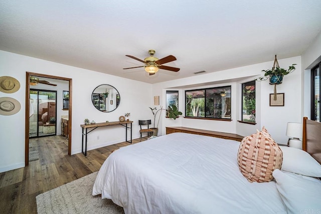 2278 Casitas Del Sol, Fallbrook, CA 92028 - bedroom featuring multiple windows, wood finished floors, and a ceiling fan