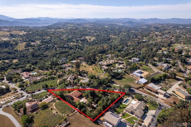 2278 Casitas Del Sol, Fallbrook, CA 92028 - aerial overview of property's location featuring a mountain backdrop and property boundaries highlighted