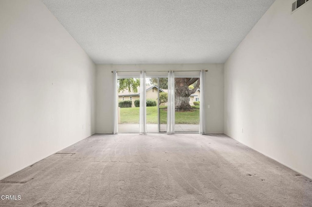 13208 Village 13 Unit 13, Camarillo, CA 93012 - spare room with carpet and a textured ceiling