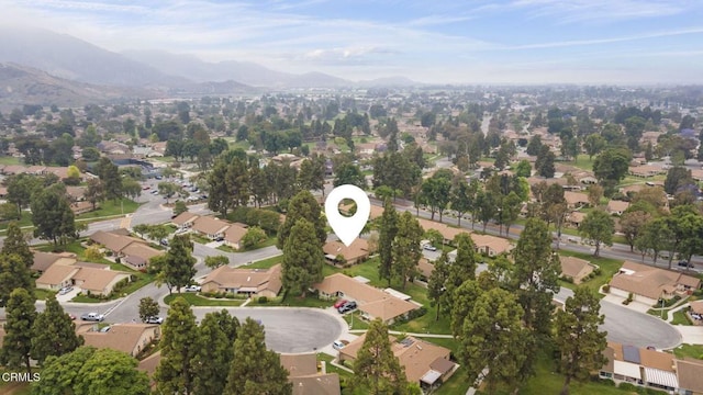 13208 Village 13 Unit 13, Camarillo, CA 93012 - aerial overview of property's location featuring a mountain backdrop and nearby suburban area