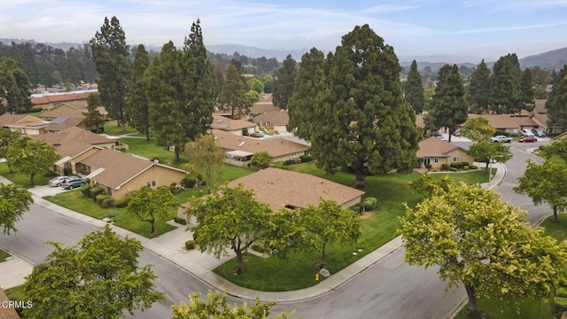13208 Village 13 Unit 13, Camarillo, CA 93012 - aerial overview of property's location featuring nearby suburban area and a mountain backdrop