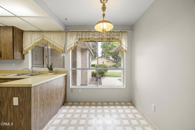 13208 Village 13 Unit 13, Camarillo, CA 93012 - unfurnished dining area with a sink and light flooring