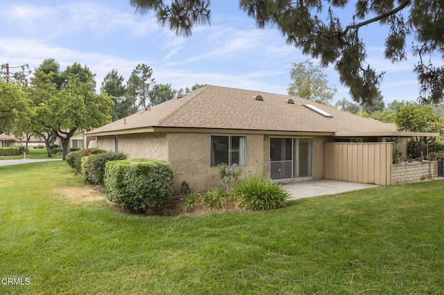 13208 Village 13 Unit 13, Camarillo, CA 93012 - rear view of house with a patio area, stucco siding, a shingled roof, and a yard