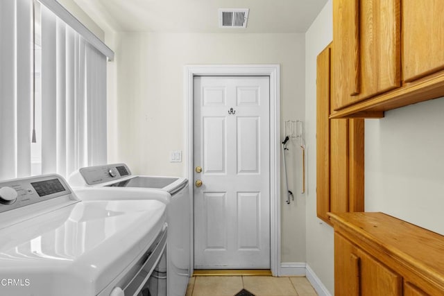 30100 Sunland Way, Tehachapi, CA 93561 - laundry room featuring independent washer and dryer, light tile patterned floors, and cabinet space