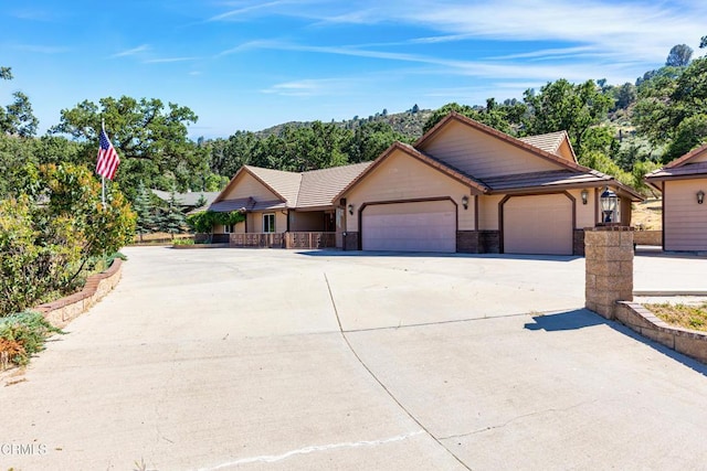 30100 Sunland Way, Tehachapi, CA 93561 - ranch-style home with a garage, concrete driveway, and a tiled roof