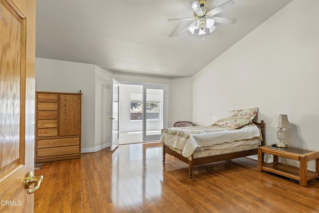 30100 Sunland Way, Tehachapi, CA 93561 - bedroom featuring wood finished floors, access to exterior, and a ceiling fan