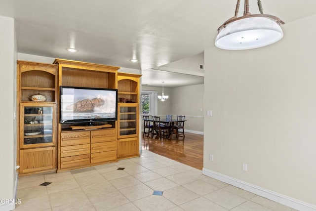 30100 Sunland Way, Tehachapi, CA 93561 - living room featuring a chandelier, recessed lighting, and light tile patterned floors