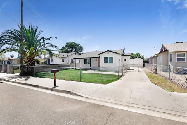7636 Elm St, San Bernardino, CA 92410 - view of front facade with a residential view, stucco siding, and a gate