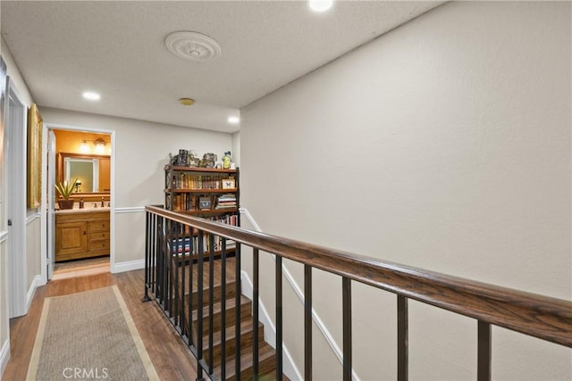 1943 Horseshoe Cir, Placentia, CA 92870 - hallway with an upstairs landing, wood finished floors, and recessed lighting