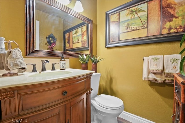 1943 Horseshoe Cir, Placentia, CA 92870 - half bathroom featuring vanity and a textured wall