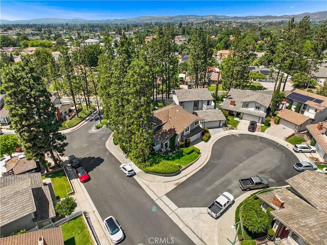1943 Horseshoe Cir, Placentia, CA 92870 - aerial overview of property's location with nearby suburban area and a mountain backdrop