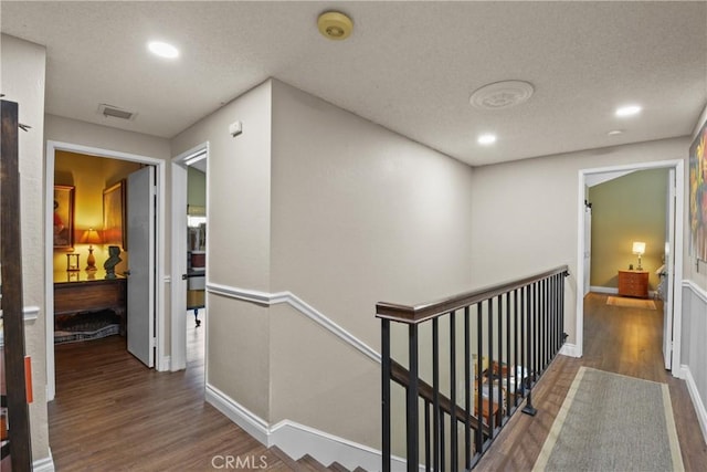 1943 Horseshoe Cir, Placentia, CA 92870 - hallway featuring an upstairs landing, wood finished floors, recessed lighting, and a textured ceiling